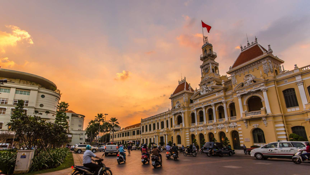 A street view at sunset in Ho Chi Minh - Sai Gon, Vietnam with motorbikes.